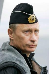Russian President Vladimir Putin watches